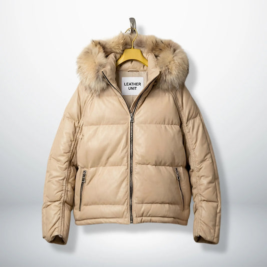 Front view of beige leather puffer jacket with real fur hood and zip pockets.