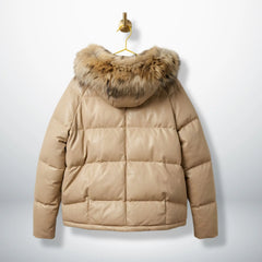 Back view of beige leather puffer coat showing large fur‑trim hood.
