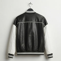 Back view of womens black and white leather varsity jacket