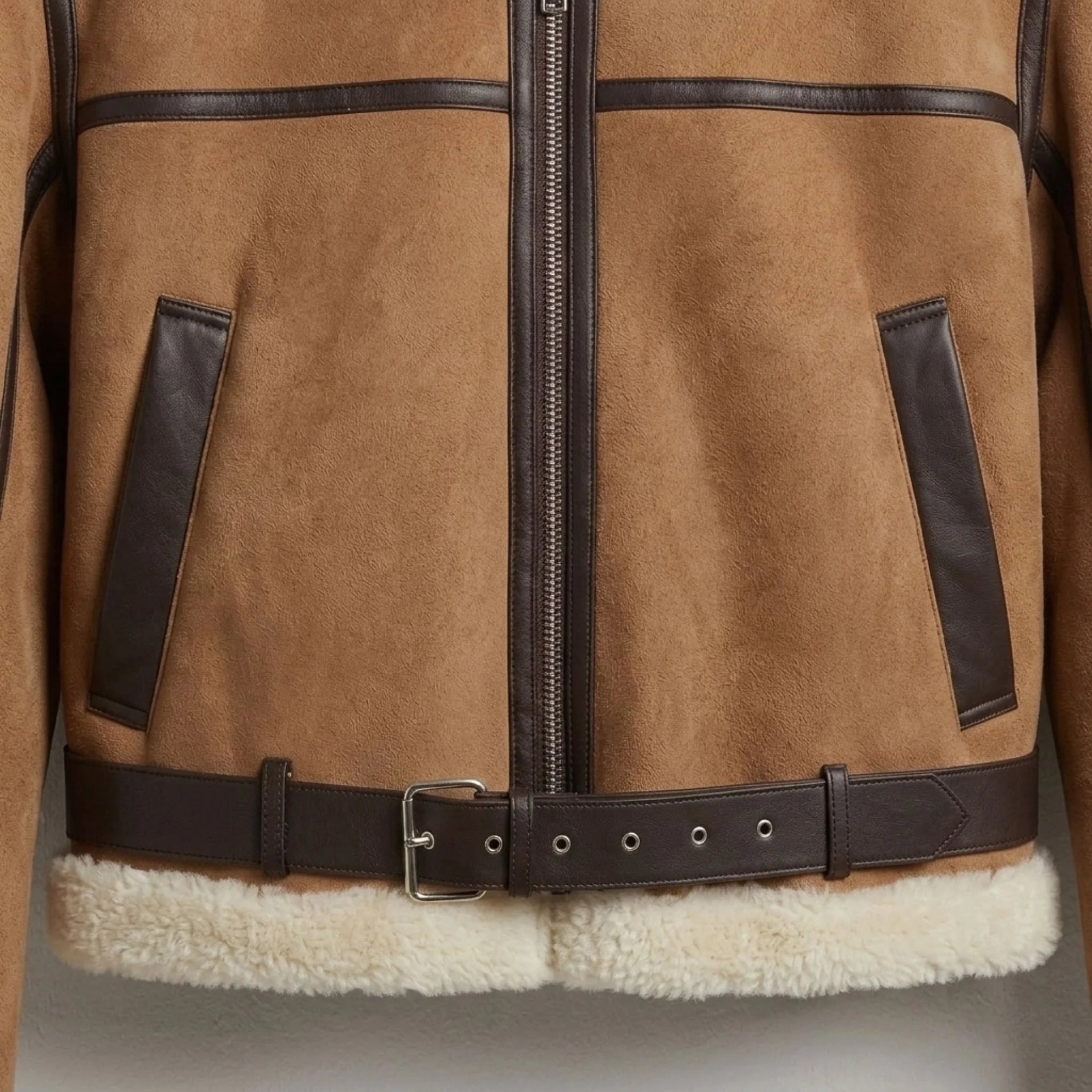 Sleeve zipper and sherpa cuff detail on womens brown shearling aviator jacket