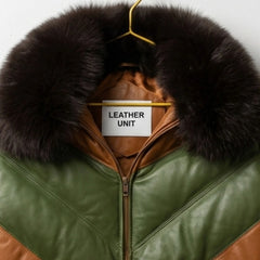 Close-up of real fur collar and Leather Unit tag on brown green puffer jacket