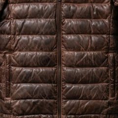 Close-up of functional pockets and heavy-duty zipper on brown leather down puffer jacket