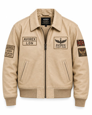 Front view of cream leather flight jacket with aviation chest patches, angled pockets, zip closure and ribbed hem