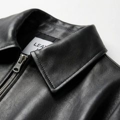 Pointed collar and front zipper detail on womens black leather jacket