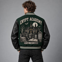 Back studio view of green gothic varsity jacket featuring Crypt Academy haunted school and graveyard artwork