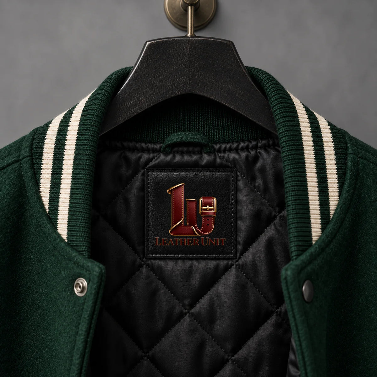 Close-up of Crypt Academy jacket collar, black quilted lining and Leather Unit interior branding patch