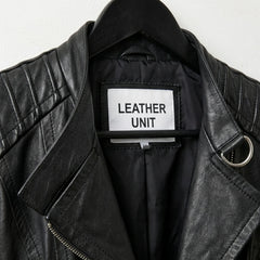 Close-up of lapel collar and Leather Unit label on black moto jacket