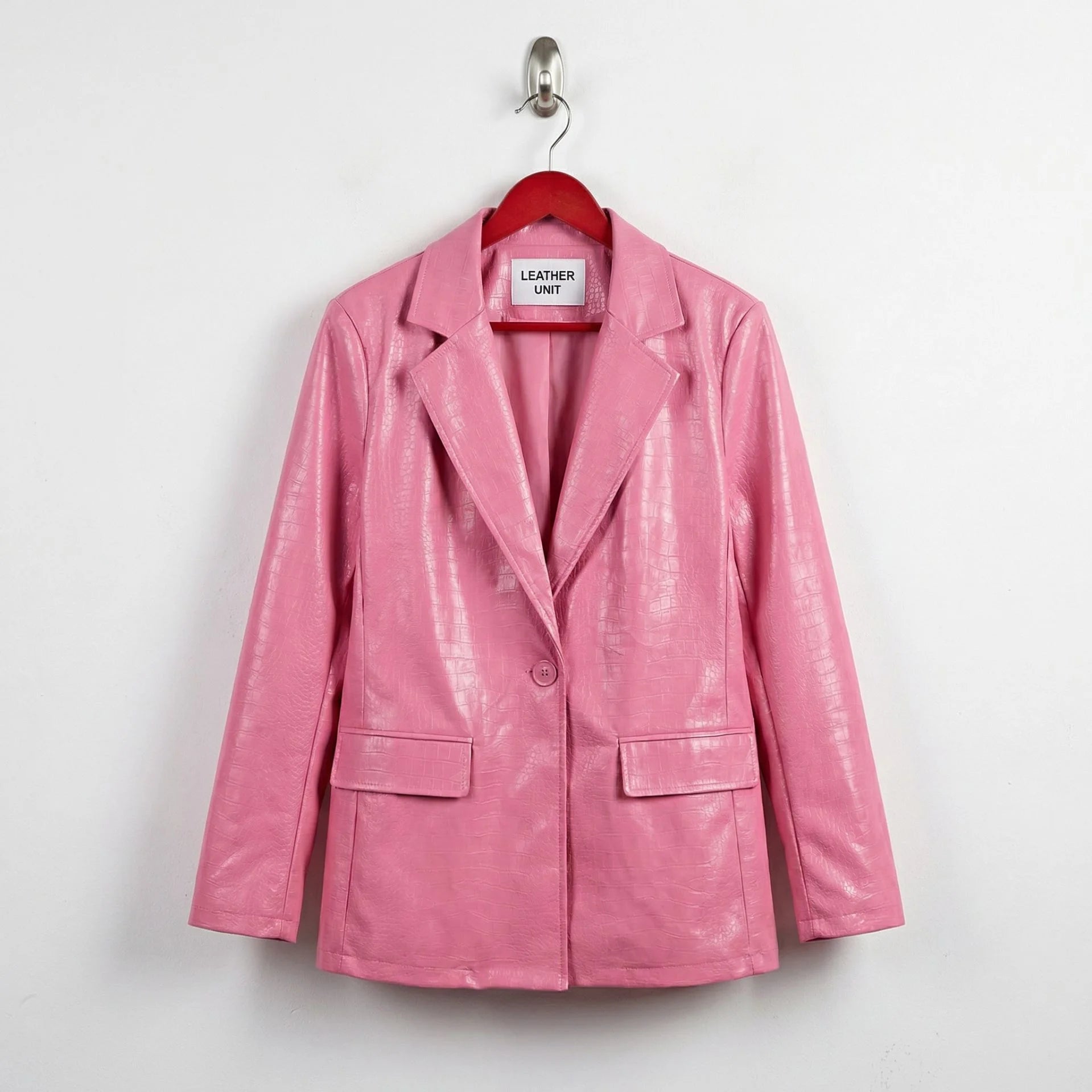 Front view of blush croc-embossed pink leather blazer for women by Leather Unit