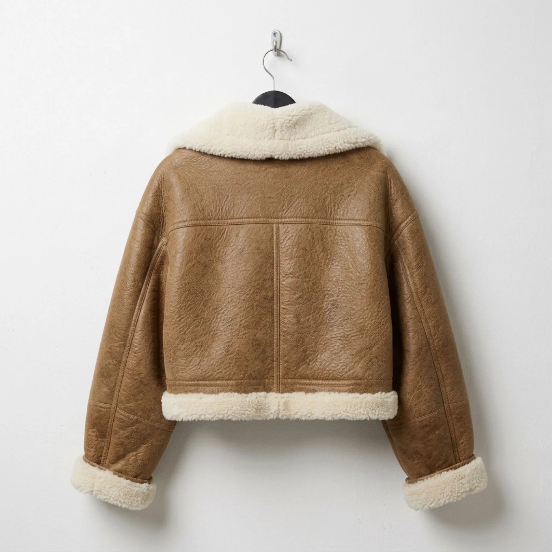 Back Side of Women’s brown cropped shearling aviator jacket