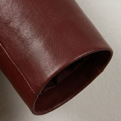 Sleeve cuff detail on smooth burgundy lambskin leather blazer