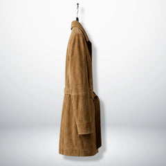 Side profile of mid‑thigh camel suede coat for women