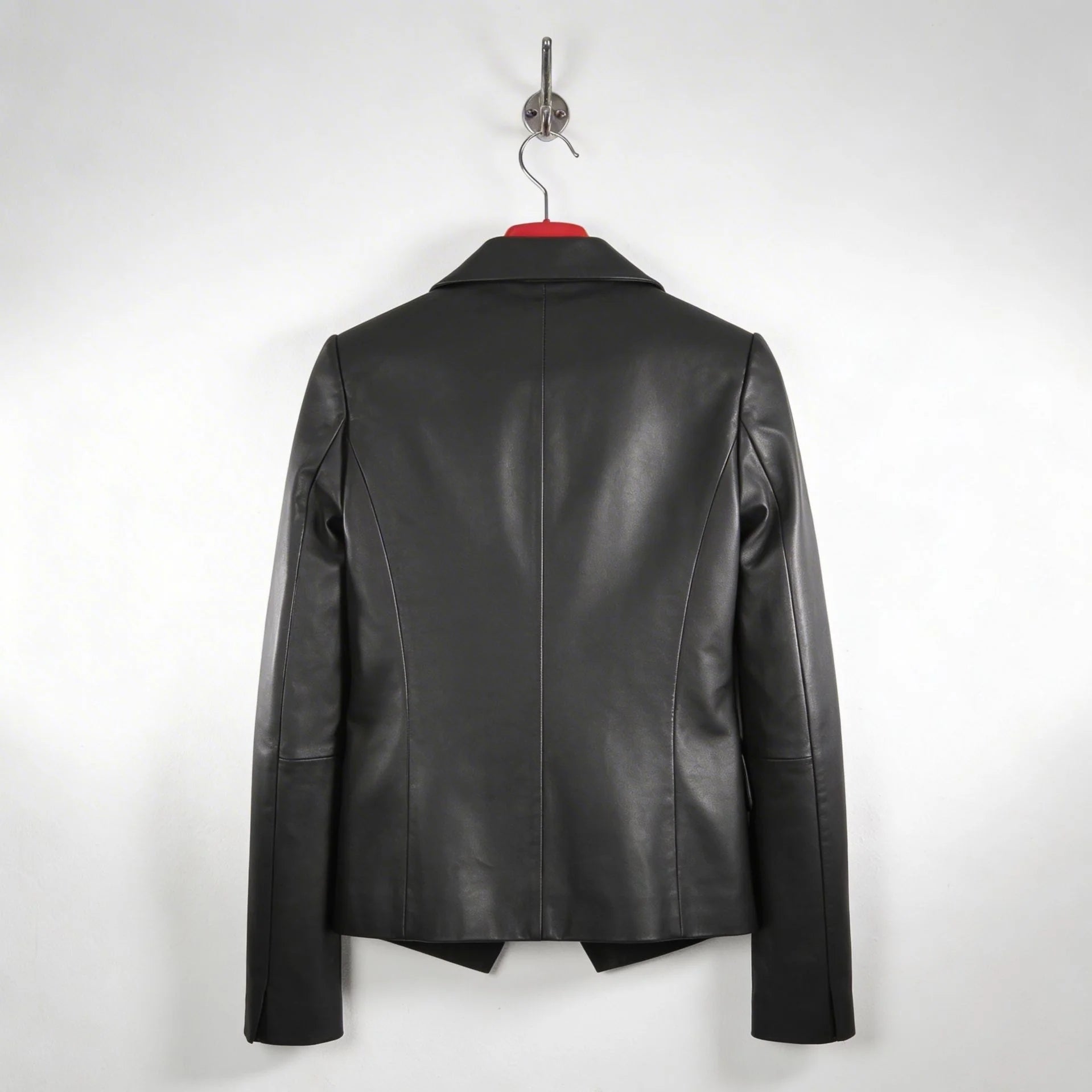 Back view of tailored black leather blazer jacket for women