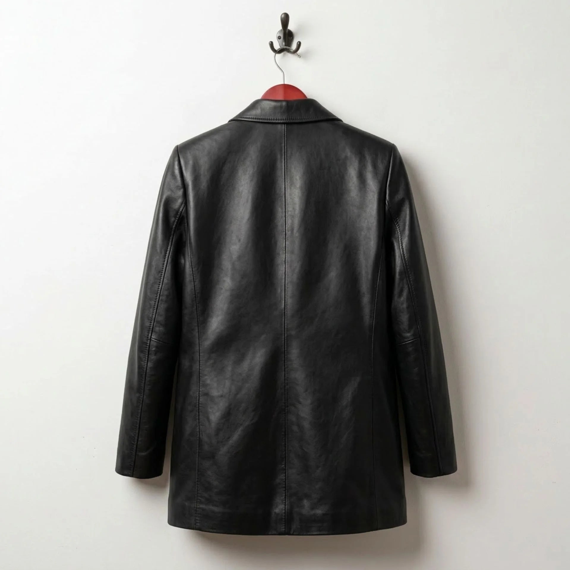 Back view of longline women’s black leather blazer jacket