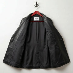Interior lining of women’s black leather blazer with inner pocket