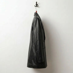 Side profile of tailored long black leather blazer for women