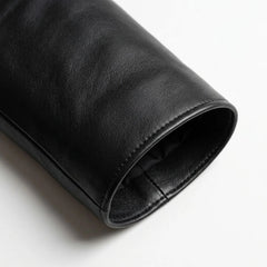 Sleeve cuff detail on smooth jet black leather blazer