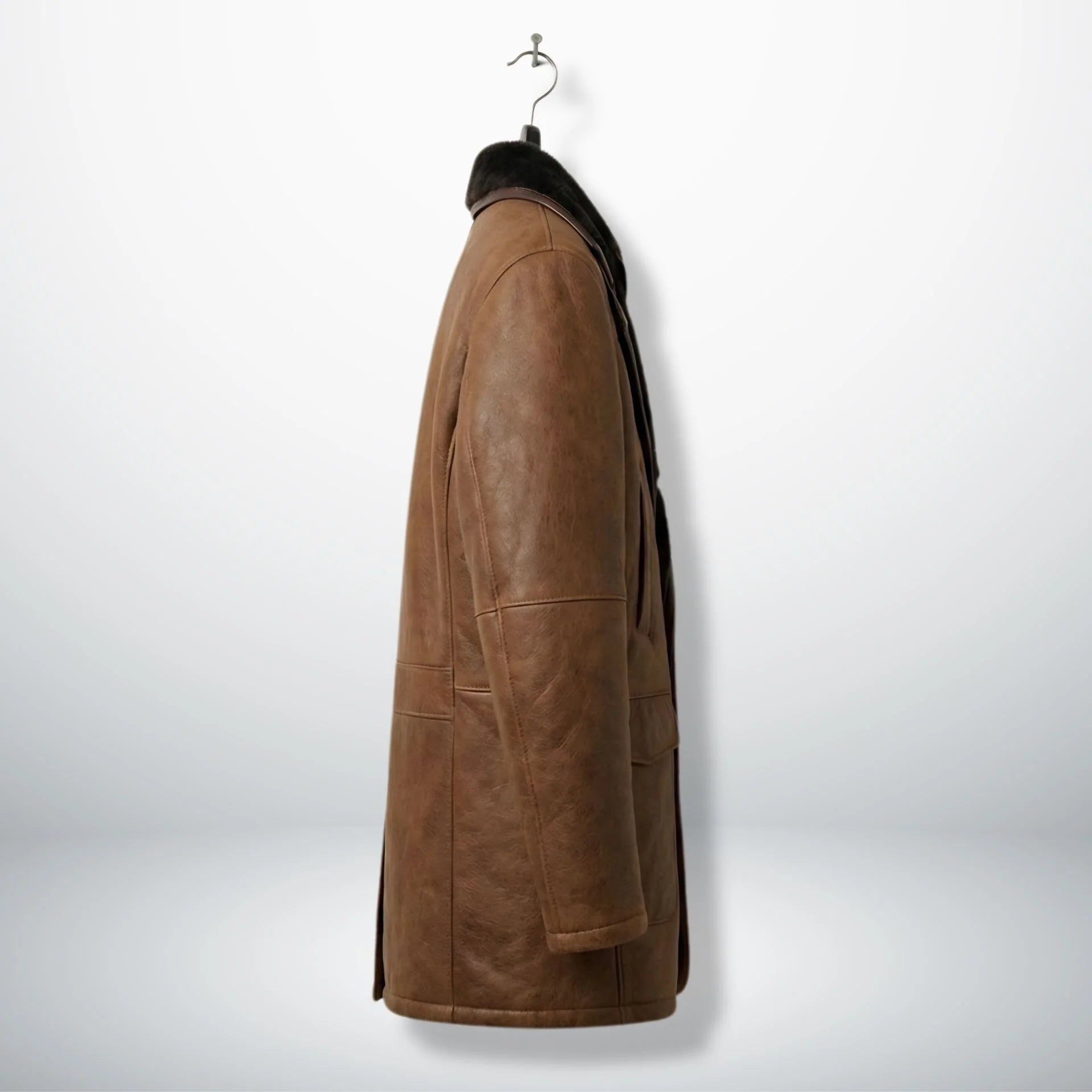 Side profile of men’s mid‑thigh brown shearling winter coat