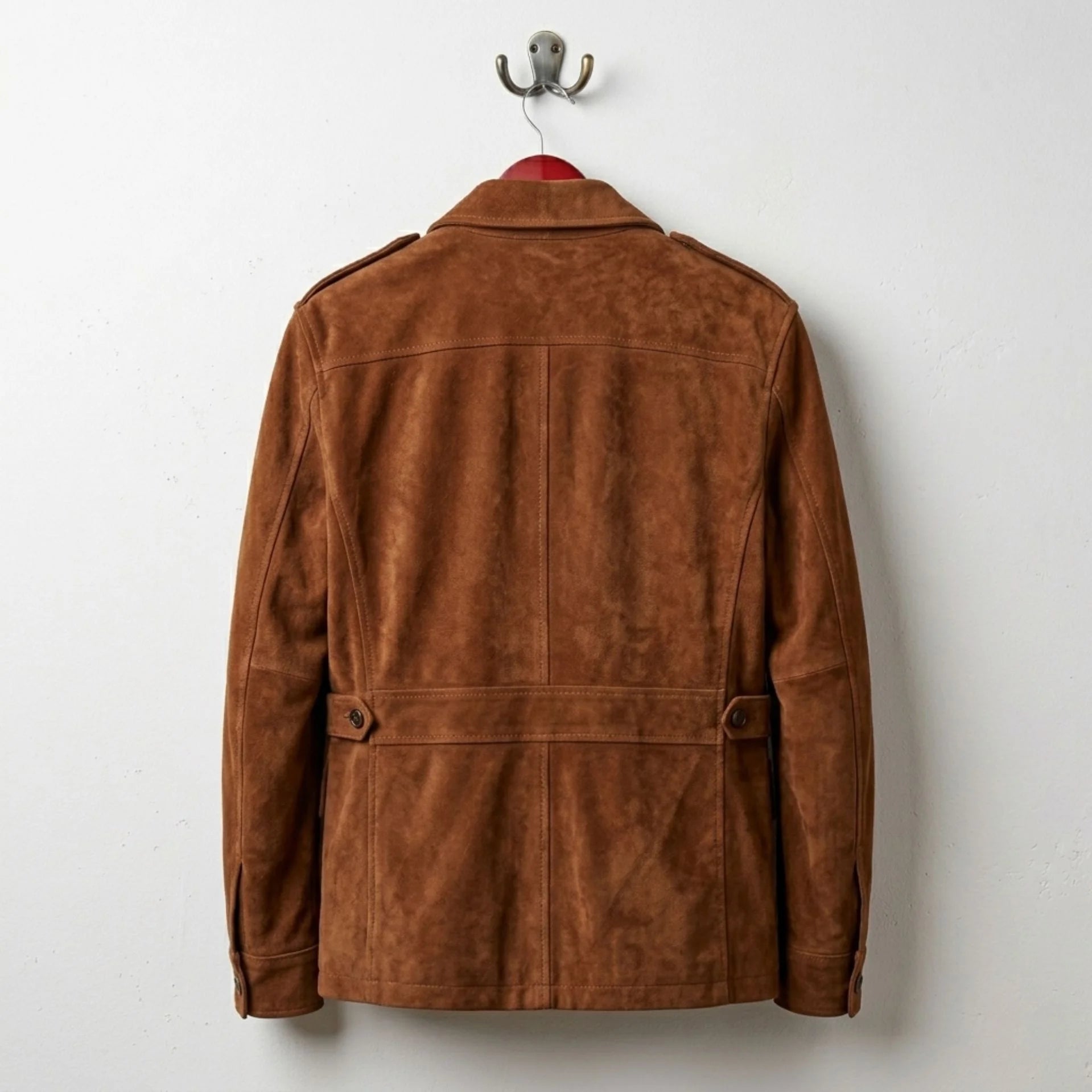 Back view of men's brown suede field coat with waist tabs