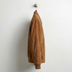 Side profile of men's mocha suede bomber jacket showing slim fit