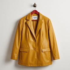 Front view of mustard yellow women’s vegan leather blazer by Leather Unit