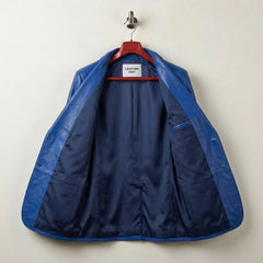 Interior lining of women’s blue leather blazer with inside pocket