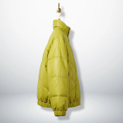 Side profile of unisex neon lime leather puffer jacket with stand collar