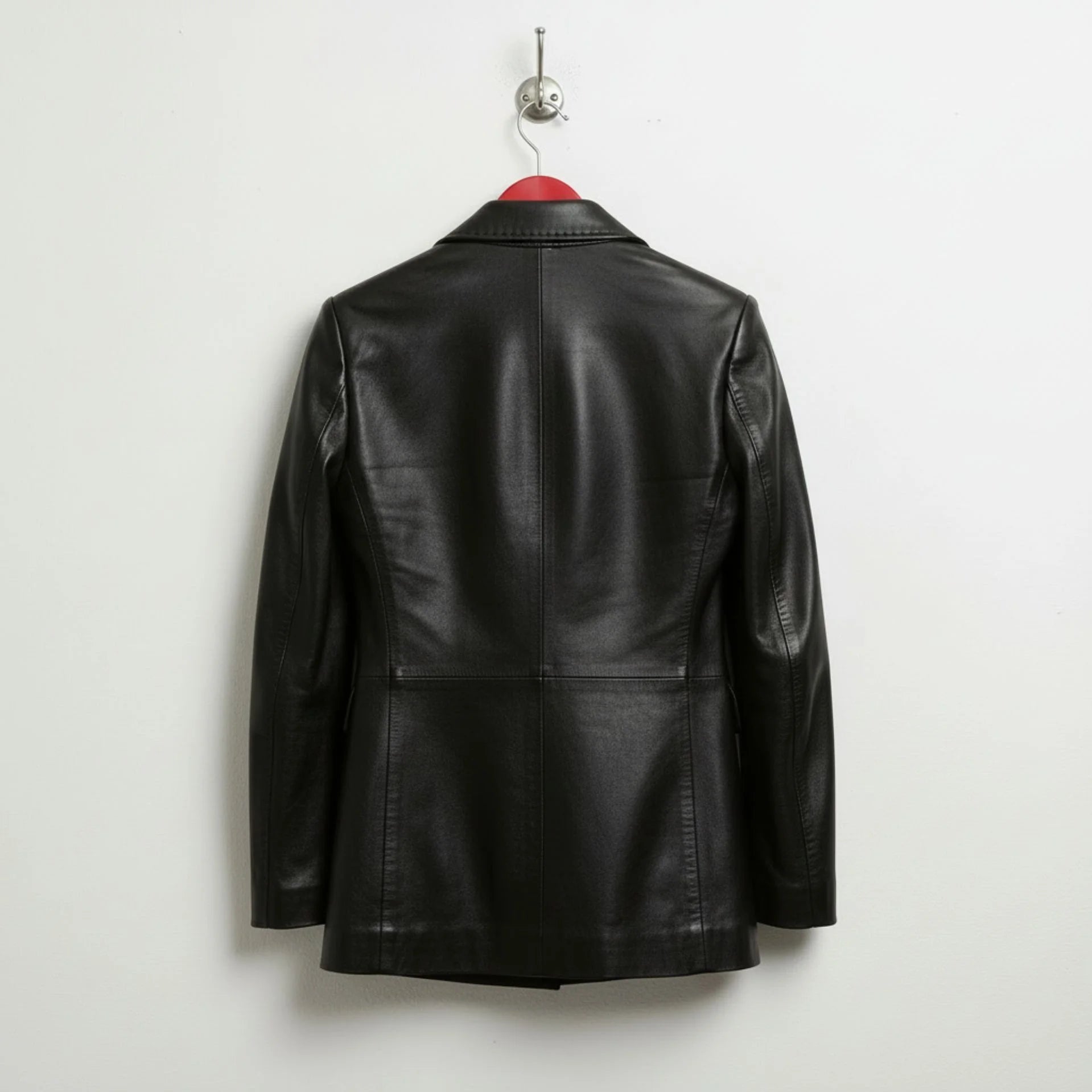 Back view of longline women’s black leather blazer jacket