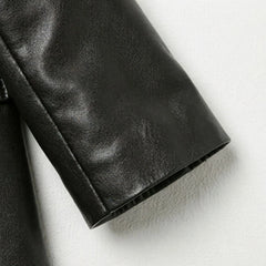Sleeve cuff detail on women’s smooth black leather blazer
