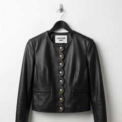 Front view of women’s black scallop edge leather jacket blazer