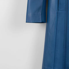 Sleeve and stitching detail on women’s blue genuine leather coat