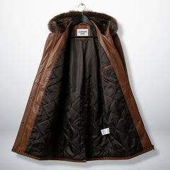 Inside quilted lining of women’s brown hooded leather coat