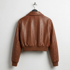 Back view of women’s brown leather bomber jacket with ribbed hem