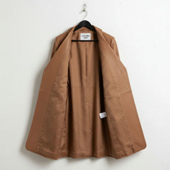 Inside view of fully lined camel brown leather long coat for women