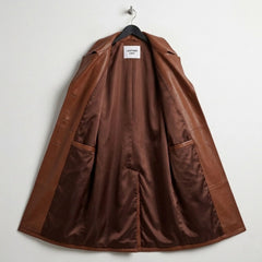 Inside view of fully lined brown leather trench coat for women