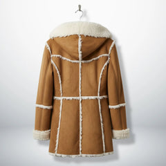 Back view of camel suede coat with white shearling seams and hood