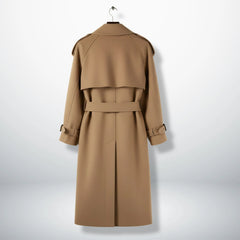 Back view of long beige wool trench coat with belt and storm flap