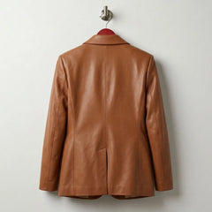Back view of women’s cognac leather blazer with hip length fit
