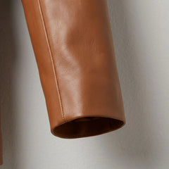 Sleeve and cuff detail on women’s cognac lambskin leather blazer