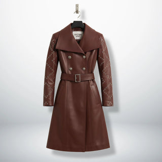Front view of women’s maroon leather trench coat with studded sleeves by Leather Unit