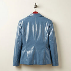 Back view of glossy sapphire blue leather blazer for women