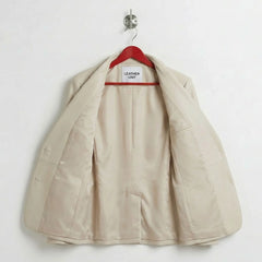 Interior lining of women’s white leather blazer with inner pocket