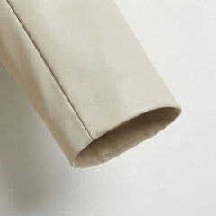 Sleeve cuff detail on smooth white leather blazer for women