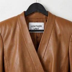 Close up of V neck collar on Leather Unit brown leather jacket