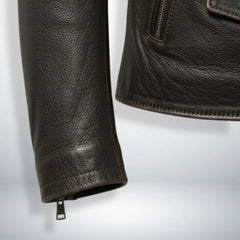 sleeve and cuff zipper detail on men's dark brown leather biker jacket.