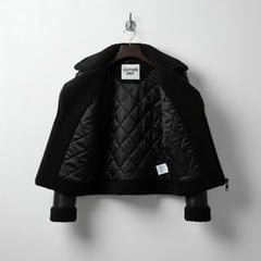 interior of mens black shearling leather jacket with quilted lining.