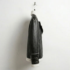 side view mens black faux leather biker jacket with sherpa trim and buckled cuffs.