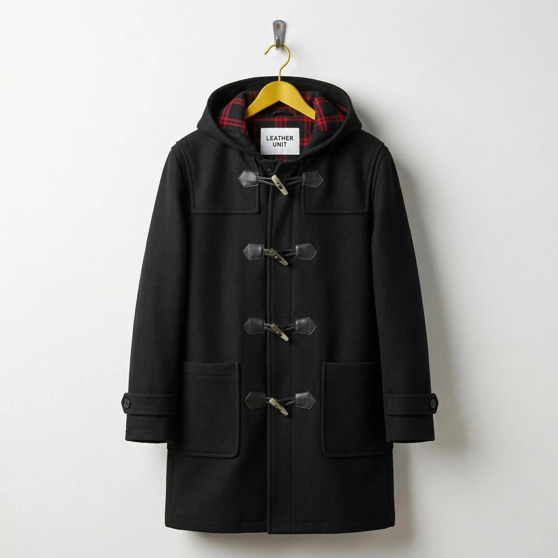 Front view of men's black hooded wool duffle coat with toggles by Leather Unit.