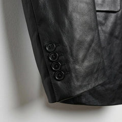 Sleeve cuff buttons on men’s black lambskin leather blazer