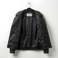 interior of men's black leather biker jacket showing black lining.