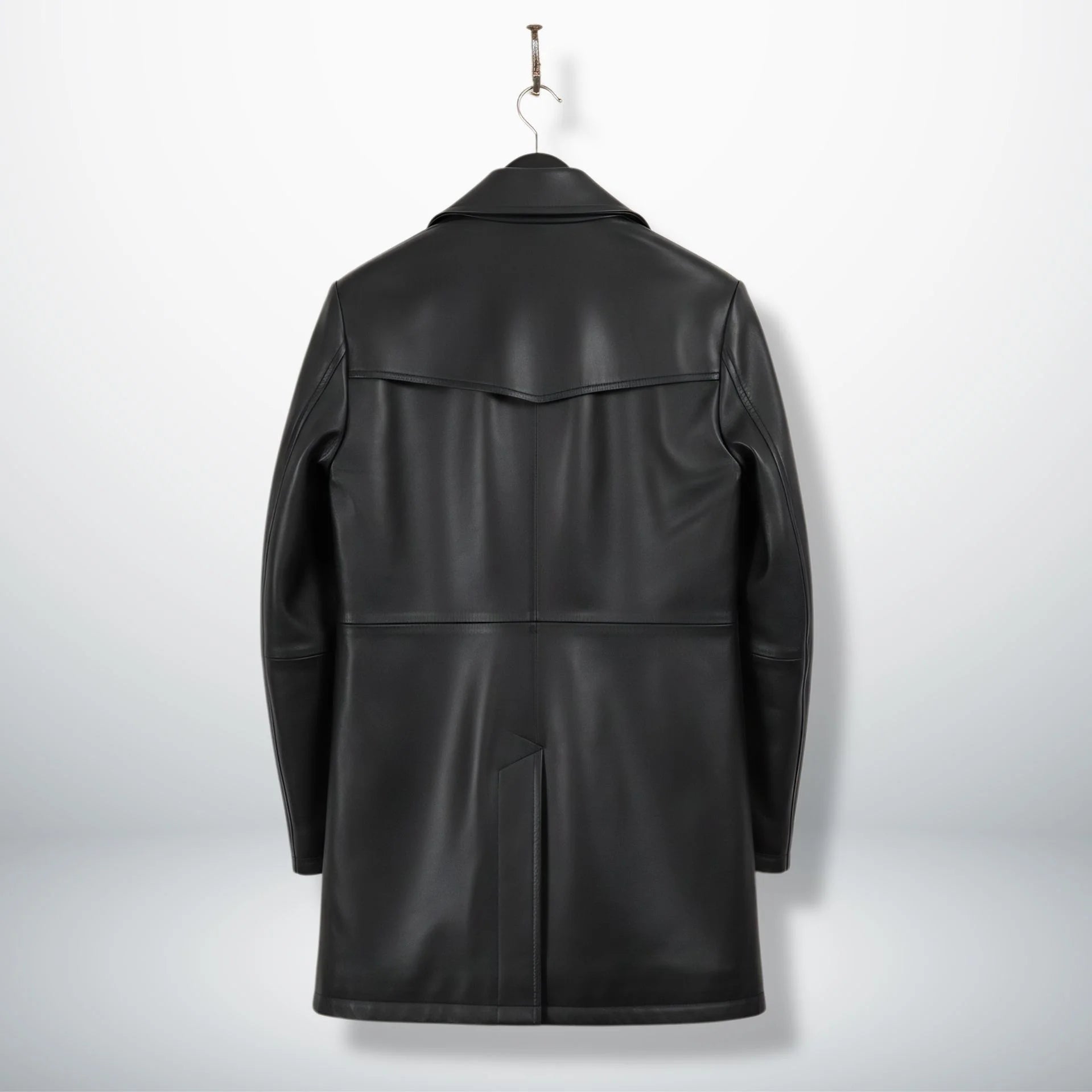 Back view of men’s 3/4 length black leather coat with yoke and vent